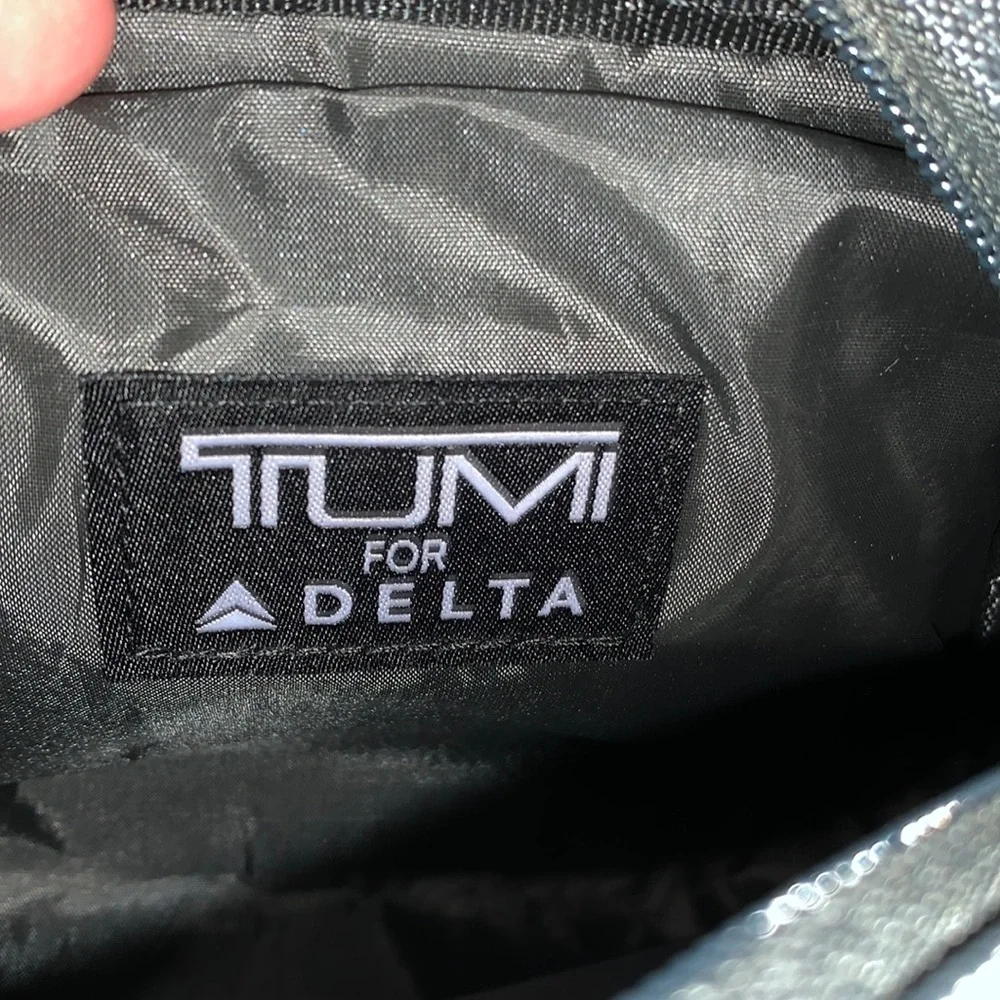 EUC TUMI gray toiletry bag